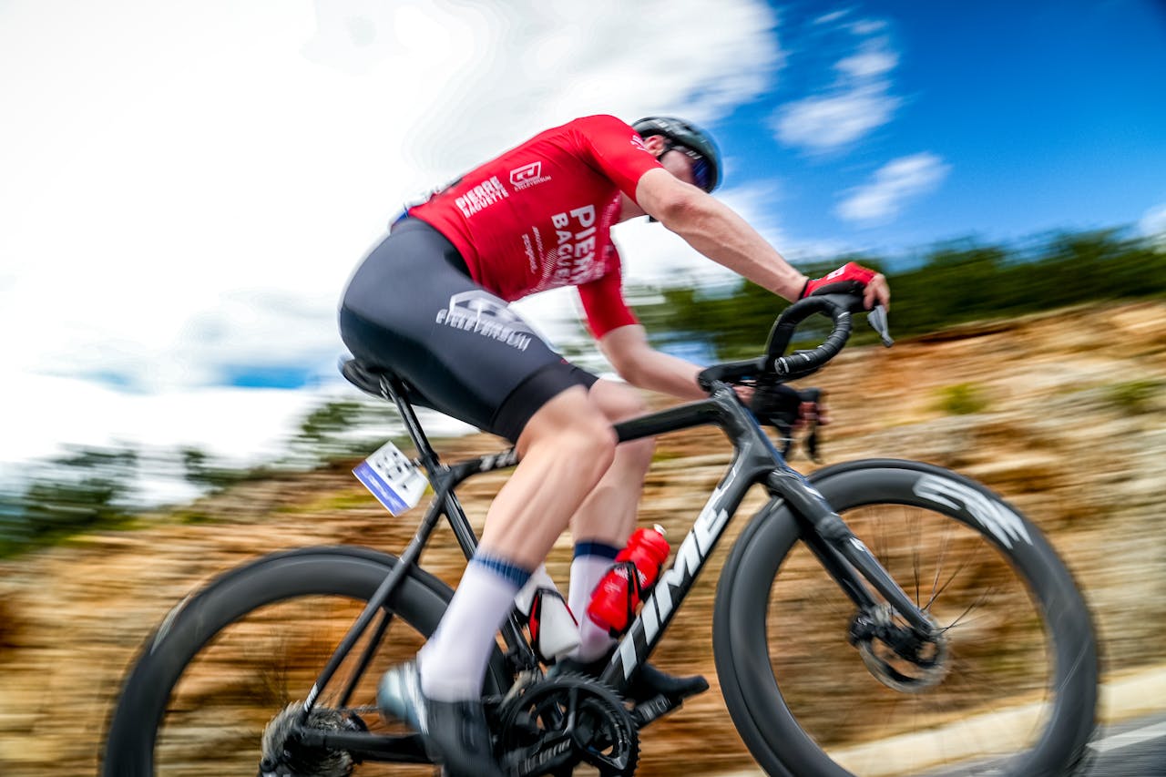 services-02 Dynamic shot of a cyclist racing on a mountain road in Mersin, Türkiye.